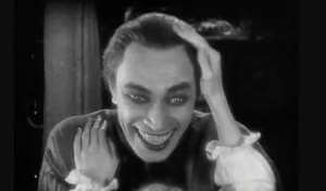 Conrad Veidt como Gwynplaine em O Homem Que Ri (1928), Universal Pictures.